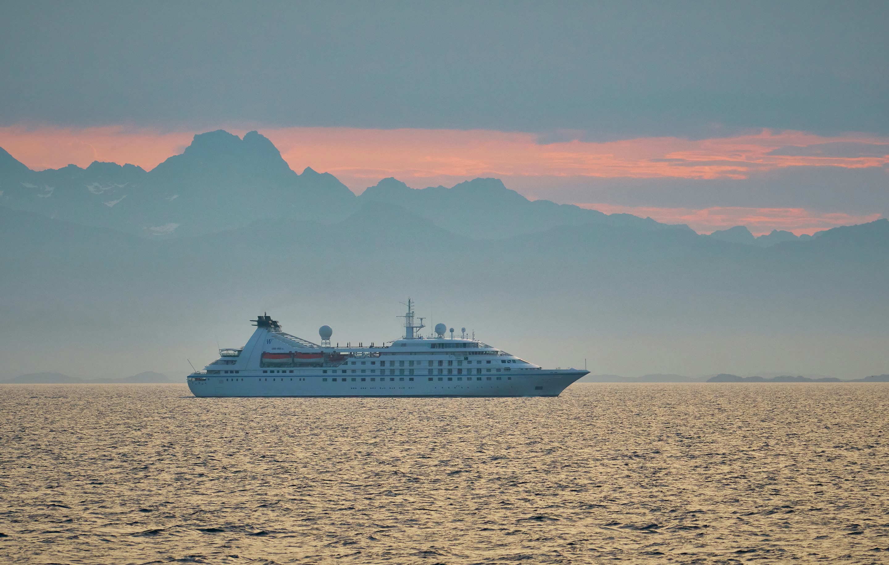 white cruise ship on body of water